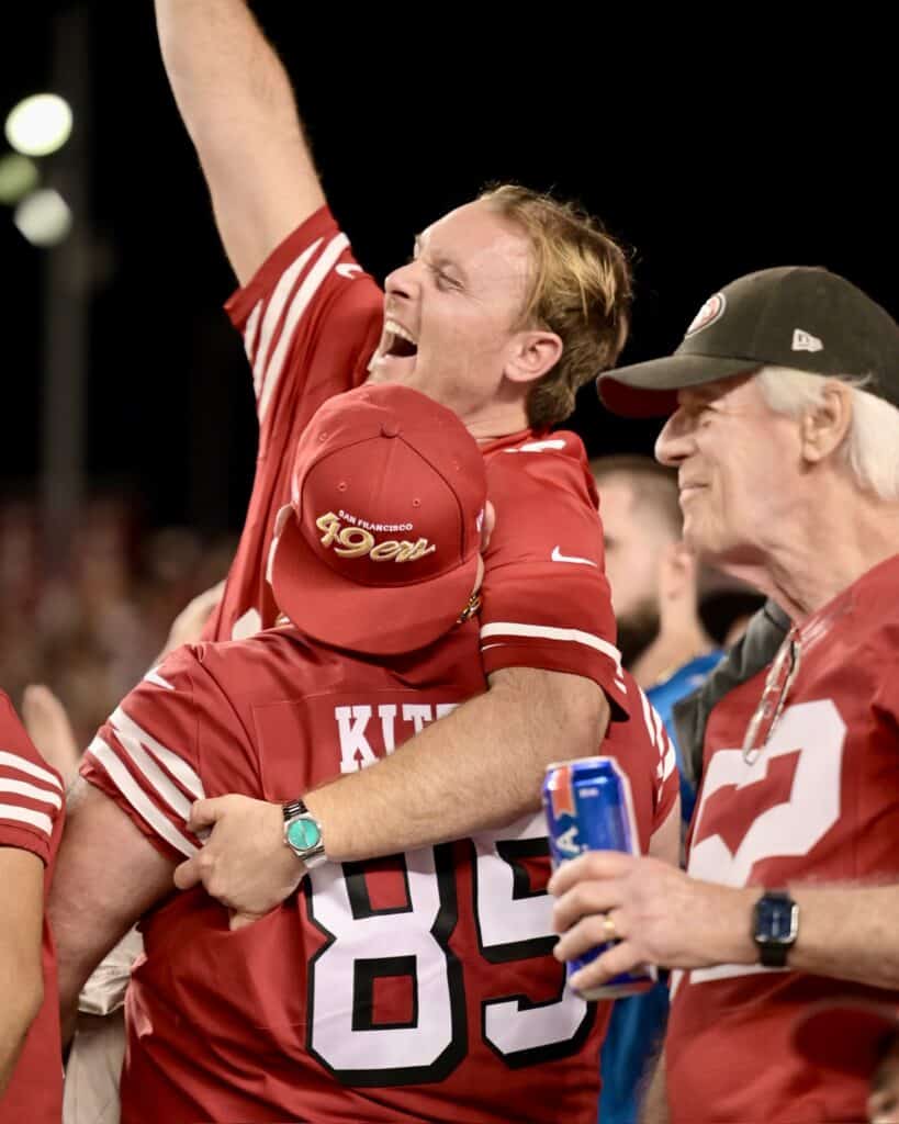 49ers fans cheering at game